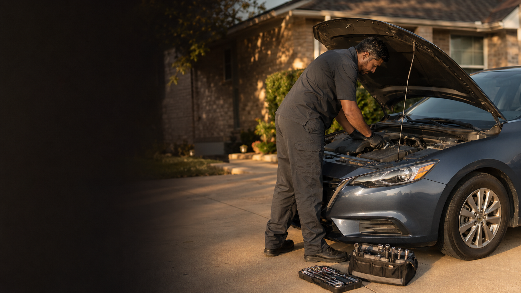 Mobile mechanic servicing a car in a Fort Worth driveway